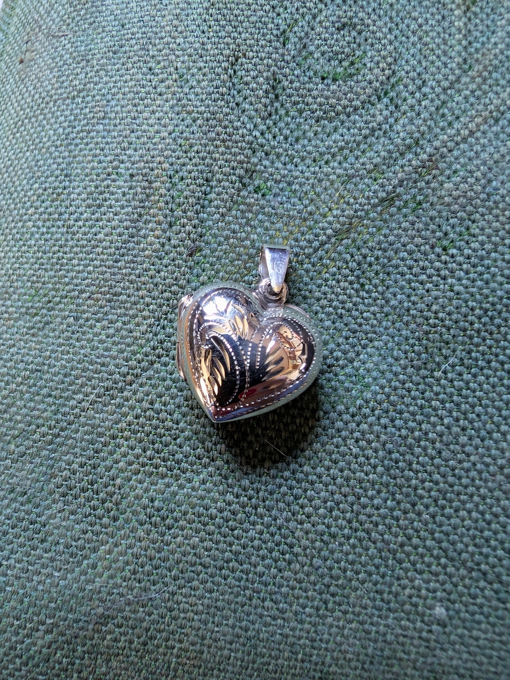 Sterling Silver heart locket with engraved floral design